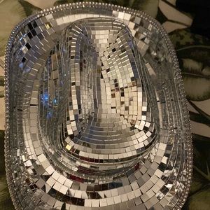 Mirrored cowgirl hat.